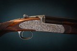 Holland & Holland 12 gauge 'Sporting' Deluxe Over-and-Under shotguns with 28 inch barrels.