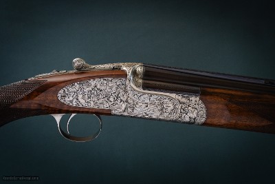 Holland & Holland 'Sporting Deluxe' 12 Gauge Over and Under shotguns with 28 inch barrels.