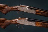 Bosis 12 gauge pair of pinless sidelock over & under's with extra barrels 