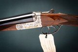 Holland & Holland 'Cavalier Deluxe' 12 Gauge Gun Dog Special Edition Gun Dog Special Edition Boxlock Ejector Shotgun with 28 inch barrels  - 2 of 7 Holland & Holland 'Cavalier Deluxe' 12 Gauge Gun Dog Special Edition Gun Dog Special Edition Boxlock Ejector Shotgun with 28 inch barrels  - 2 of 7