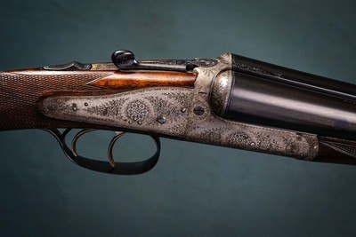 Holland & Holland 12 gauge 2-Inch chamber Dominion Model Back-Action ejector Shotgun with 28 inch barrels