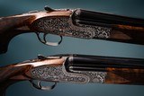 Fabbri Deluxe Composed Pair of 12 gauge Sidelock Ejector Over & Under Shotguns with 28 & 31 inch barrels.  - Image 1 of 6