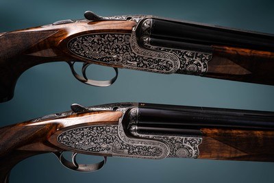 Fabbri Deluxe Composed Pair of 12 gauge Sidelock Ejector Over & Under Shotguns with 28 & 31 inch barrels.  - Image 1 of 6
