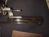 COLT PYTHON 357
6"
NICKEL
inbox with papers - 3 of 15