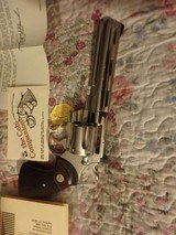 COLT PYTHON 357
6"
NICKEL
inbox with papers - 9 of 15