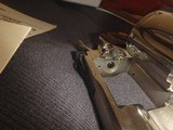 COLT PYTHON 357
6"
NICKEL
inbox with papers - 8 of 15