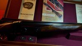 Original 1951 Cased Abercrombie and Fitch Pristine
(probable NIB), Winchester, Model 21 Deluxe Field Grade, 12-ga. 99% condition. - 5 of 14