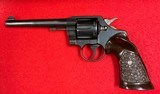 Vintage Colt Official Police .38 Special Revolver with Six Inch Heavy Barrel Manufactured in 1948 - 1 of 15