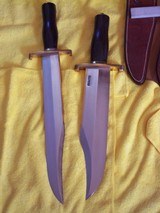 Randall Made Knives two unknown models from 1971 one blade is 13" one blade is 11" unknown wood handle with gold yellow line on top of blade - 10 of 13
