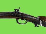 L. Grundmann in Stendal 12 Gauge Percussion Cap SxS
Shotgun Engraved Locks and Hammers.
Hammer Safeties.
Finely figured Damascus Barrels - 7 of 9