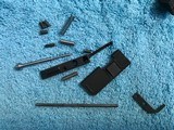 (52)Bolt carrier Colt M16/9 and (52a)Various M16/9 Parts - 10 of 12