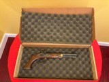 NIB THOMPSON CENTER PATRIOT PISTOL
.45 CALIBER