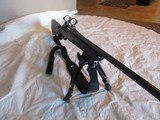 Tikka T3 Blued, Black synthetic stock, 30-06. Leupold bases and 30mm rings, Black Hawk 9-13" Bi pod and padded sling. - 9 of 9