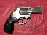 Smith & Wesson Plus 3-5-7, 3 inch unfluted bbl, 7 shot.Fired once. - 2 of 12