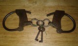 Antique Hand Cuffs - 2 of 3