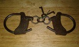 Antique Hand Cuffs - 1 of 3