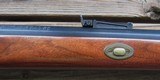 THOMPSON CENTER DELUXE .50 CAL. FACTORY BUILT PLAINS RIFLE [1981] HALF STOCK, 28 INCH BARREL, BRASS HARDWARE - 7 of 13