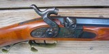 THOMPSON CENTER DELUXE .50 CAL. FACTORY BUILT PLAINS RIFLE [1981] HALF STOCK, 28 INCH BARREL, BRASS HARDWARE - 8 of 13