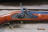 THOMPSON CENTER DELUXE .50 CAL. FACTORY BUILT PLAINS RIFLE [1981] HALF STOCK, 28 INCH BARREL, BRASS HARDWARE - 2 of 13