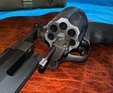 Scoped Taurus Raging Hunter-.357 and .38 special, 8.37