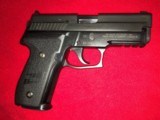 Sig Sauer P229 with Sauer German Frame**40 S&W Caliber**Comes with 3 factory 12 round magazines
