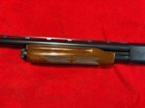 Remington 870 Wingmaster 12 Gauge 2 3/4 Inch Chambered Pump Action Shotgun with 28 inch Modified Choke Ventilated Barrel - 9 of 10