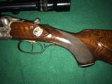 J.P. Sauer & Sohn Model 3000 Game Scene Engraved Drilling 222 Rem X 12 GA X 12 GA W/ German Kahles Helia-Super 3-9×40 Variable Scope - 9 of 16