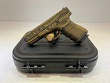 New Glock 19 Gen 4 Bronze Flag 9mm, 4" Barrel - 1 of 13