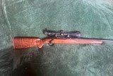 Ruger M77 7X57 Caliber With Tang Safety  Red Recoil Pad  22 “ Barrel  Nikon 3X9X40 Prostaff Scope - 1 of 9