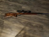 CUSTOM RIFLE EXCELLENT CONDITION 257 ACKLEY IMPROVED THUMBHOLE LAMINATED STOCK McGOWEN
BARREL - 9 of 20