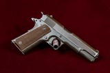 FANTASTIC 1919 PRODUCTION COLT M1911 MILITARY SERVICE PISTOL W/ EARLY NRA DCM 1960 RE ISSUE PAPERWORK.