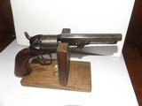 Colt 1849 31 Cal. pocket revolver. Stagecoach scene. Original.