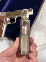 Cased pair of Colt 1911 Nickel pistols with presentation case.
.45 acp - 2 of 15