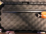 This is a Nikko auto 500 Vent rib in vector choke special steel barrel Browning clone - 11 of 12