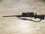 Remington Model 700 ADL Synthetic Bolt Action Centerfire 7mm Rem Mag Rifle with 26" Barrel and Scope - 1 of 11