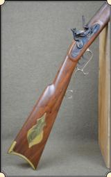 Thompson Center American made..50 cal. flintlock rifle. - 1 of 12