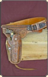 Wonderfully floral carved Single Action Buscadaro rig - 1 of 10