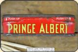Antique Match Safe, a miniature Prince Albert Tobacco can . This is a very old match safe. The top is hinged and is tight. The bottom has the PRINCE A - 6 of 7