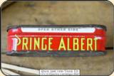 Antique Match Safe, a miniature Prince Albert Tobacco can . This is a very old match safe. The top is hinged and is tight. The bottom has the PRINCE A - 7 of 7