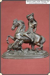 Statue of indian attacked by mountain lion - 1 of 10