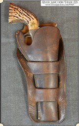 Classic Herman H. Heiser holster for a 4 3/4 or 5 1/2 inch Colt SAA - 1 of 11