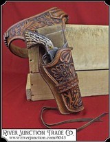 Wonderfully floral carved Single Action Fast Draw rig - 1 of 7