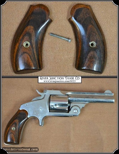 Smith & Wesson Caliber: 38 S&W Grip: Rose Wood RJT#6623