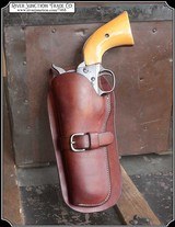 (HEY LEFTY) H. H. Heiser Holster for a 4 3/4 inch barrel Colt SAA and its clones. - Image 1 of 7