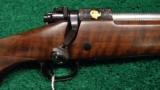 WINCHESTER MODEL 70 DELUXE ENGRAVED FACTORY EXHIBITION GUN - 1 of 12