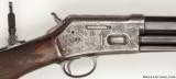 VERY INTERESTING PAIR OF FACTORY ENGRAVED COLT PUMP ACTION LIGHTNING RIFLES
- 14 of 15