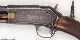VERY INTERESTING PAIR OF FACTORY ENGRAVED COLT PUMP ACTION LIGHTNING RIFLES
- 4 of 15