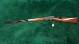 LONG STOCKED WINCHESTER MODEL 1886 RIFLE
- 12 of 13