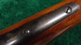 LONG STOCKED WINCHESTER MODEL 1886 RIFLE
- 9 of 13