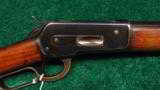 WINCHESTER MODEL 1886 RIFLE - 1 of 12